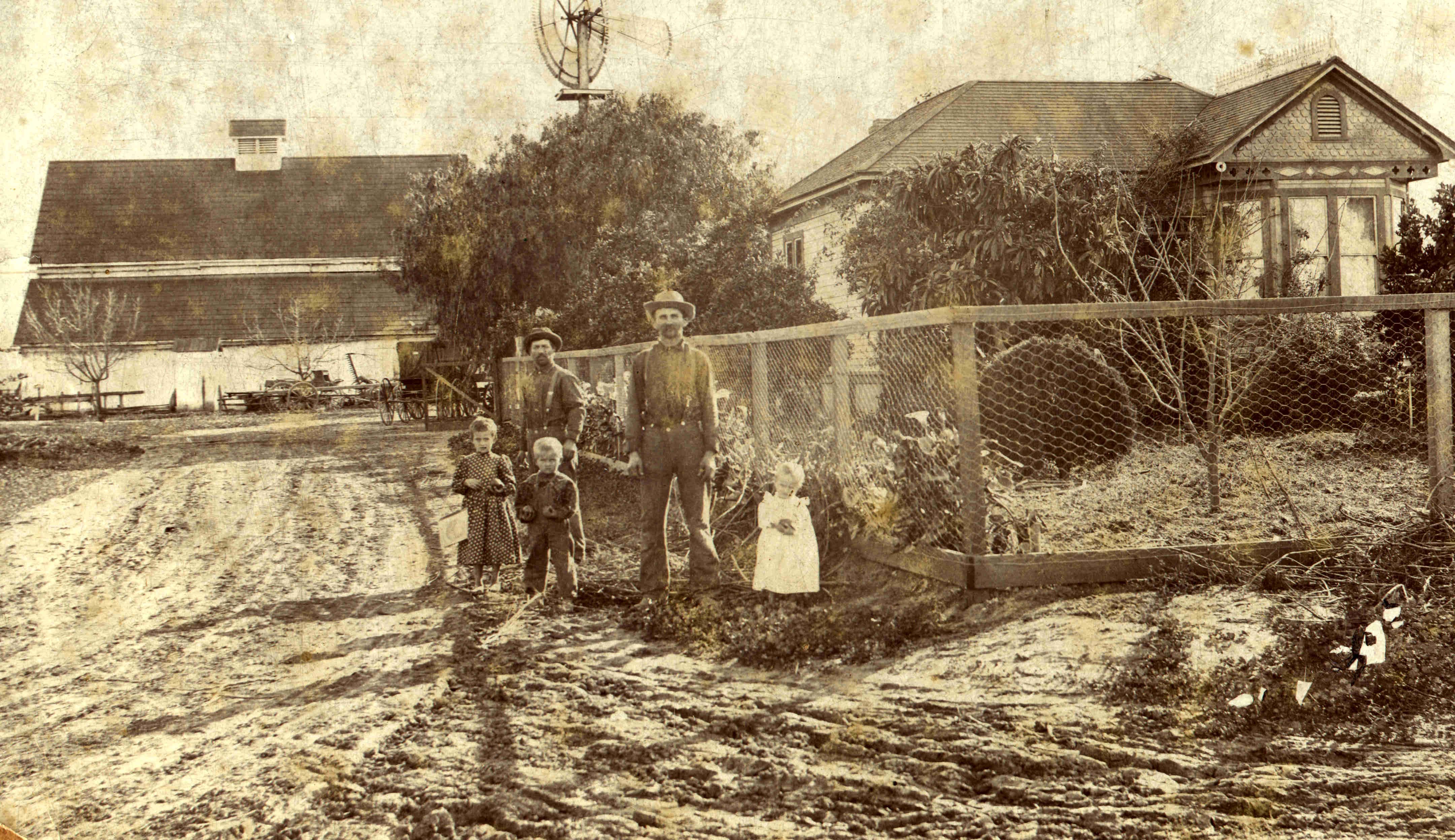 John Wagner's Farm House, Dated 1900, Located at 1730 W. Manchester Ave., City of Los Angeles, CA.  Left to right: the kids are Amanda, Irene, and Margaret.